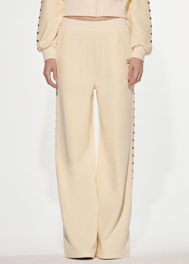 PANTALONE LUNGO IN FELPA CON BORCHIE BUTTER YELLOW