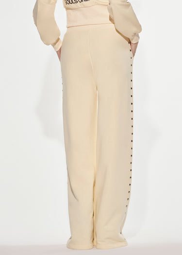 PANTALONE LUNGO IN FELPA CON BORCHIE BUTTER YELLOW