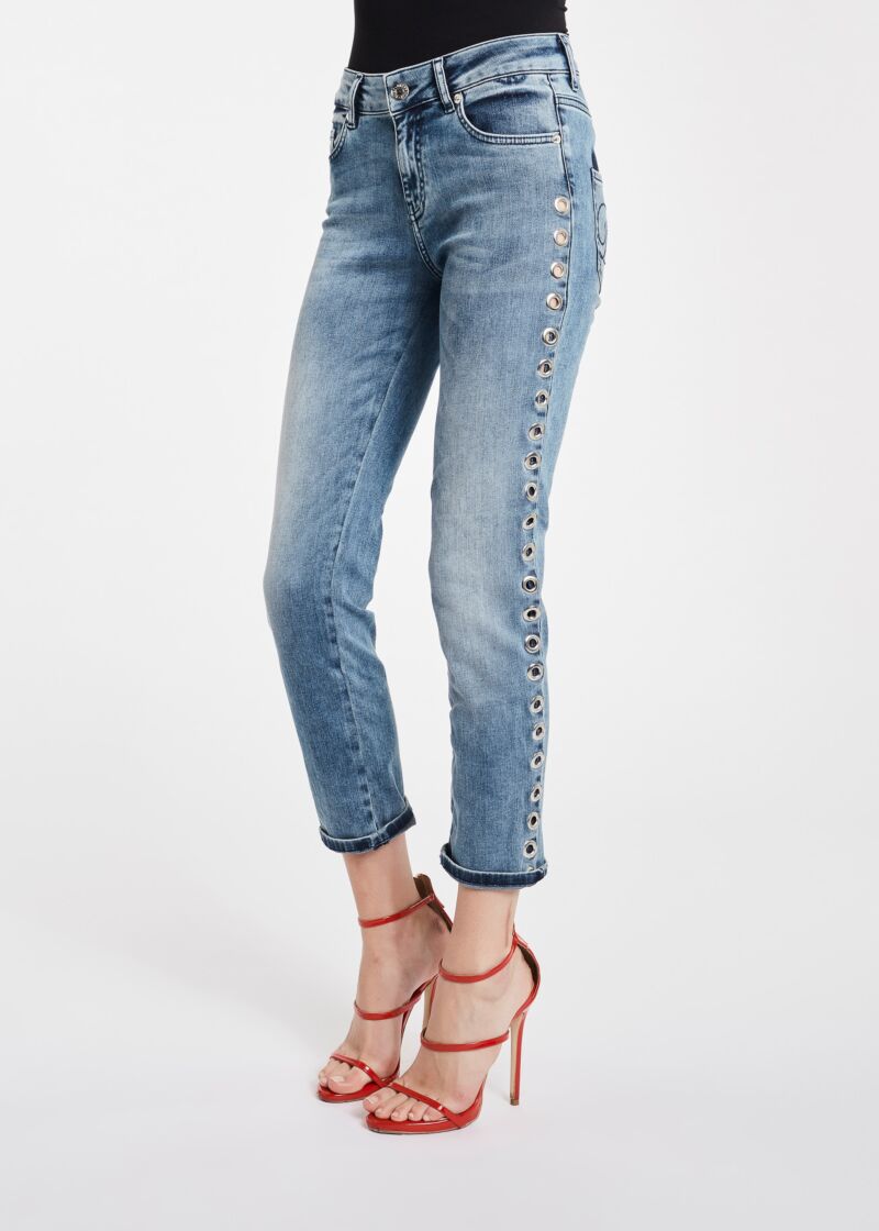 Jeans with eyelets