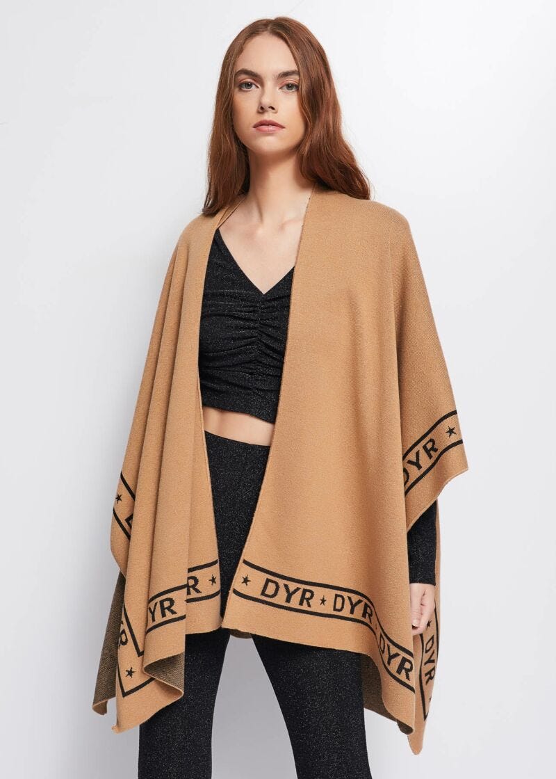 Knit cape with logo