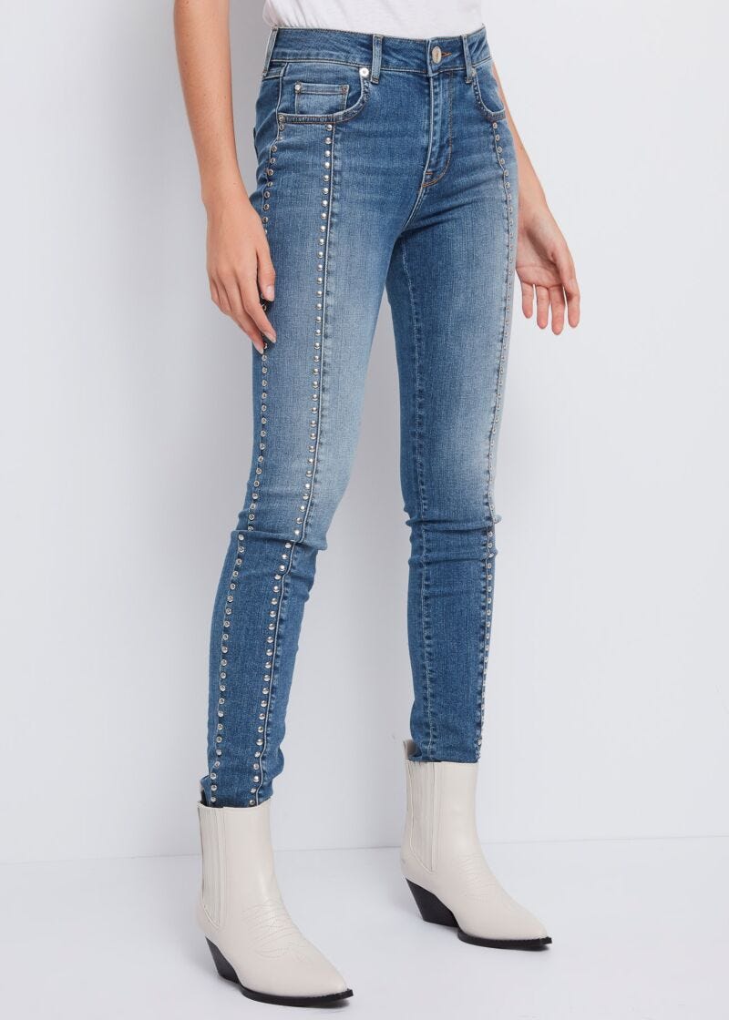 Jeans skinny con borchie