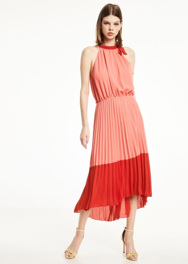 Dress in pleated fabric