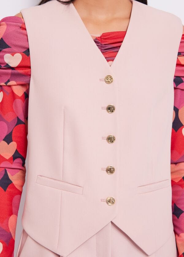 Gilet with buttons