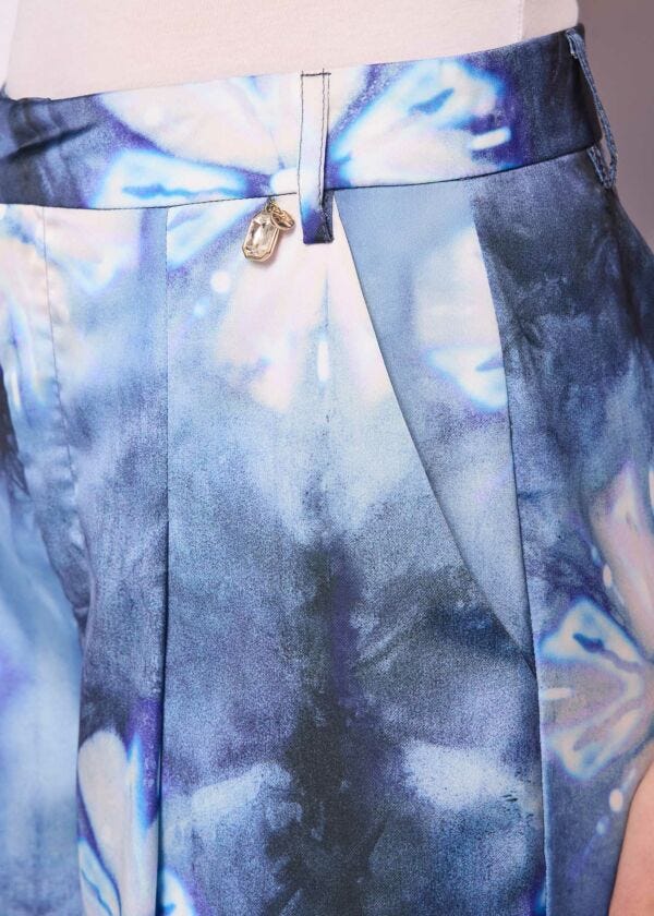 Pantaloni blu in raso stampato