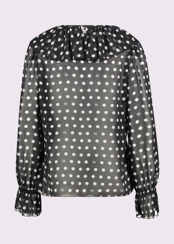 Blusa nera in georgette a pois