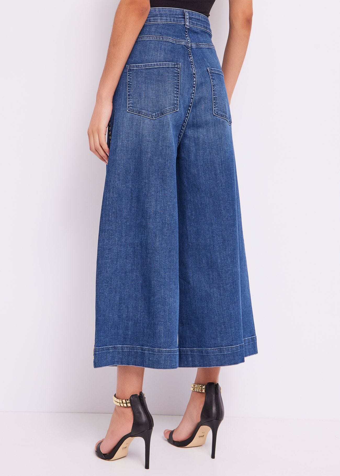 Jeans con borchie