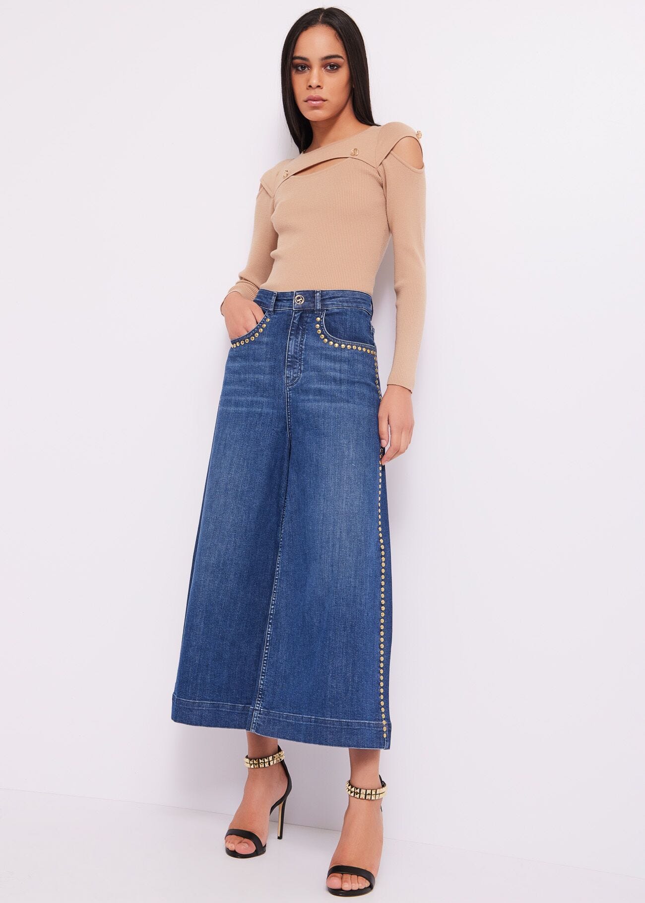 Jeans con borchie