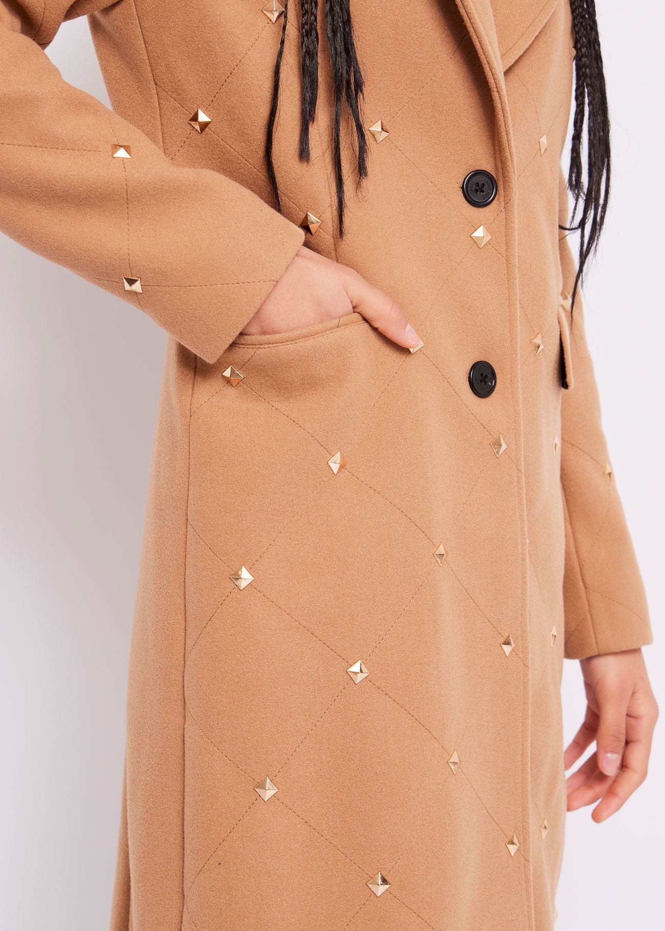 Cappotto con borchie