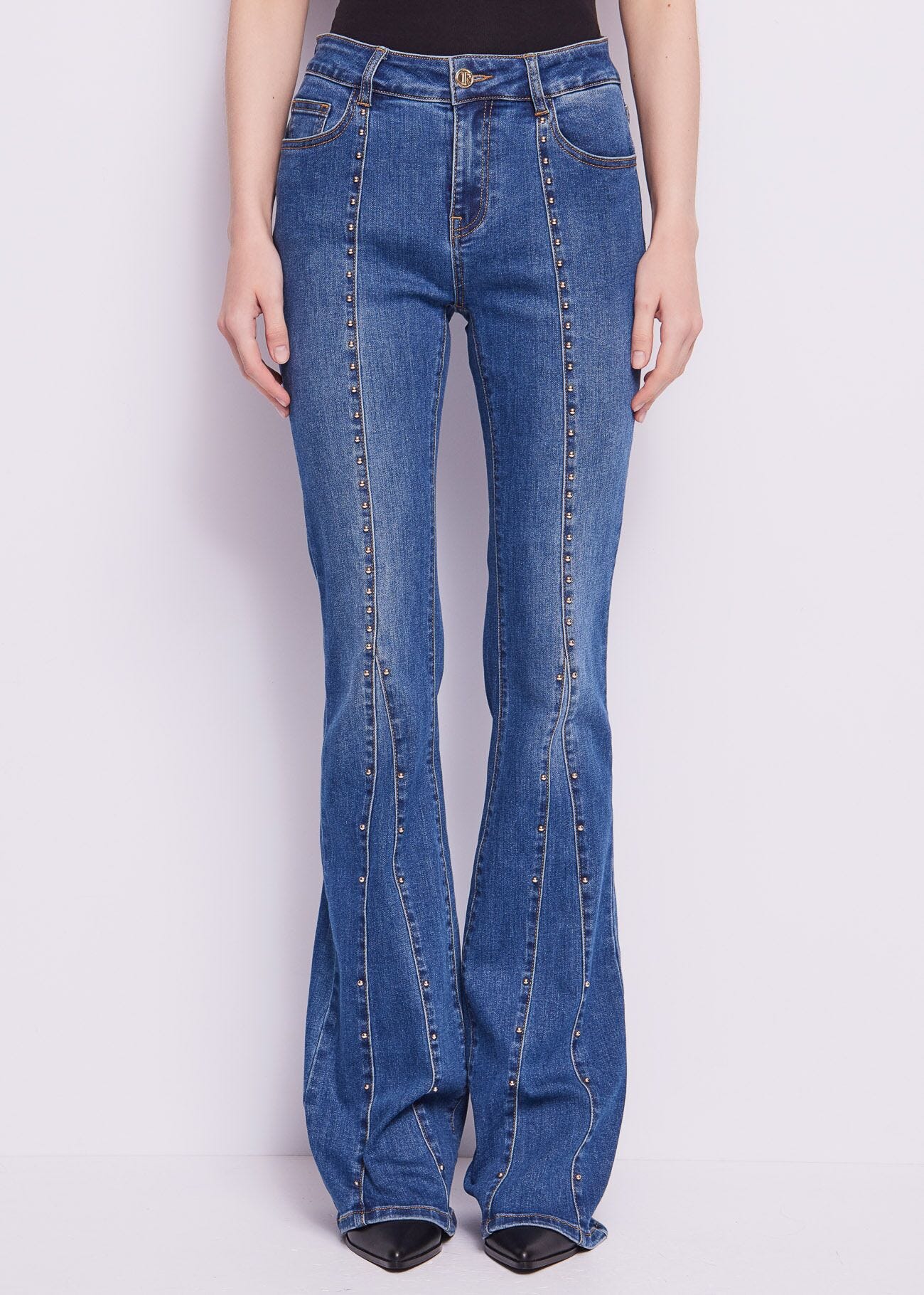 Flared cotton jeans with studs