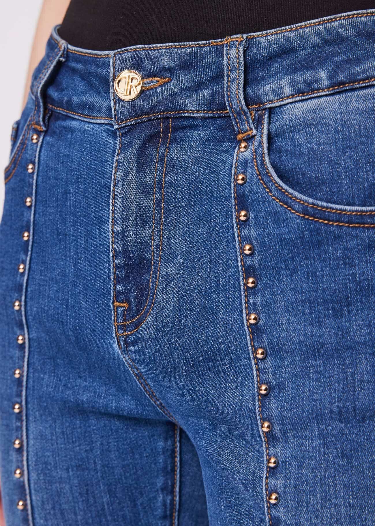 Flared cotton jeans with studs