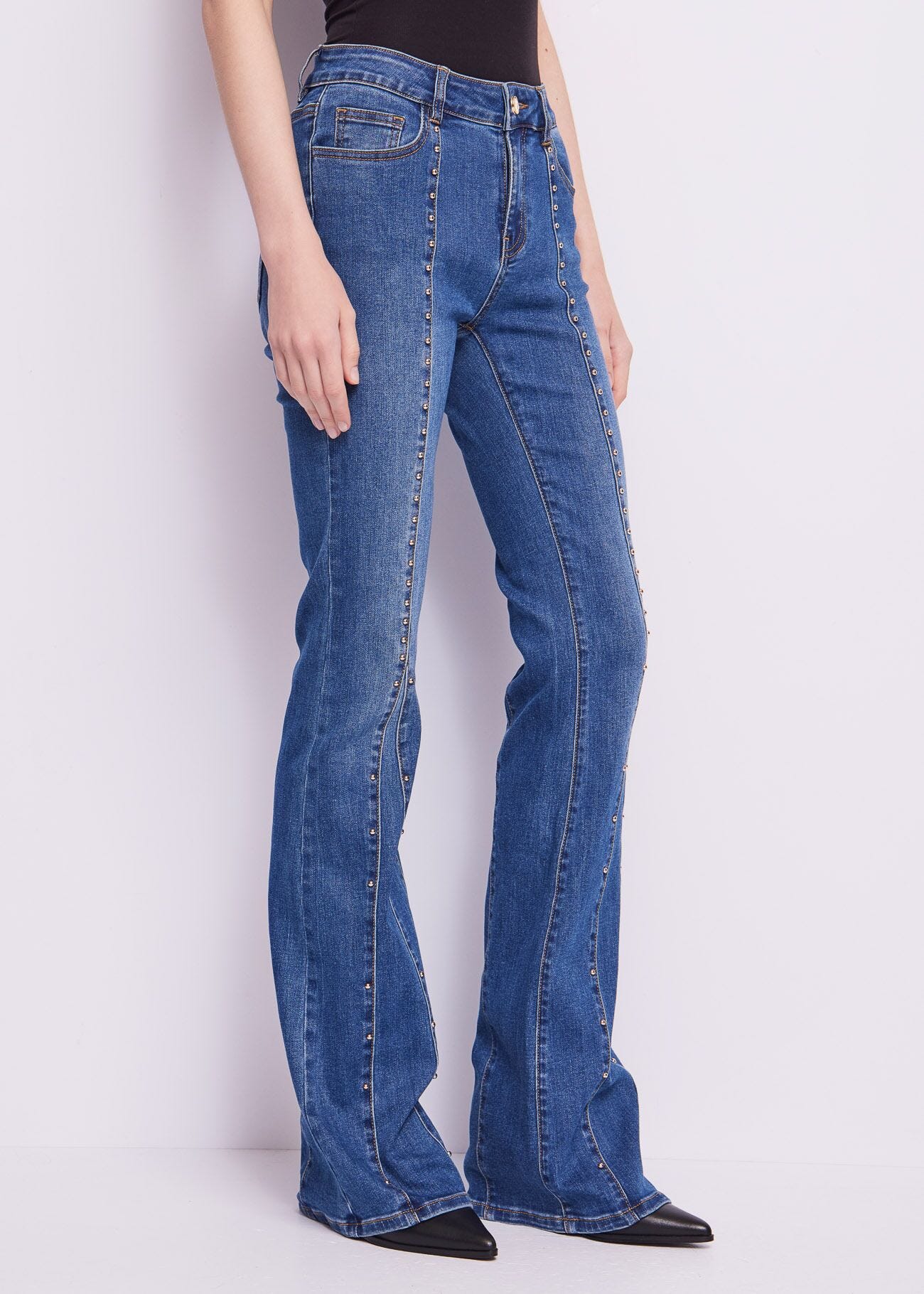 Flared cotton jeans with studs