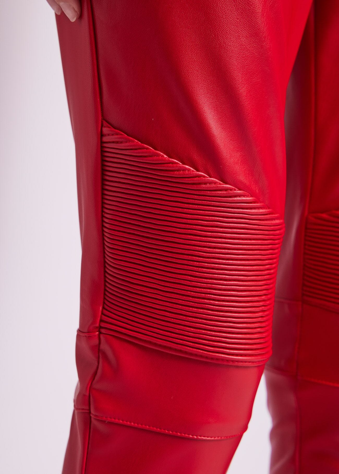 Red leatherette trousers