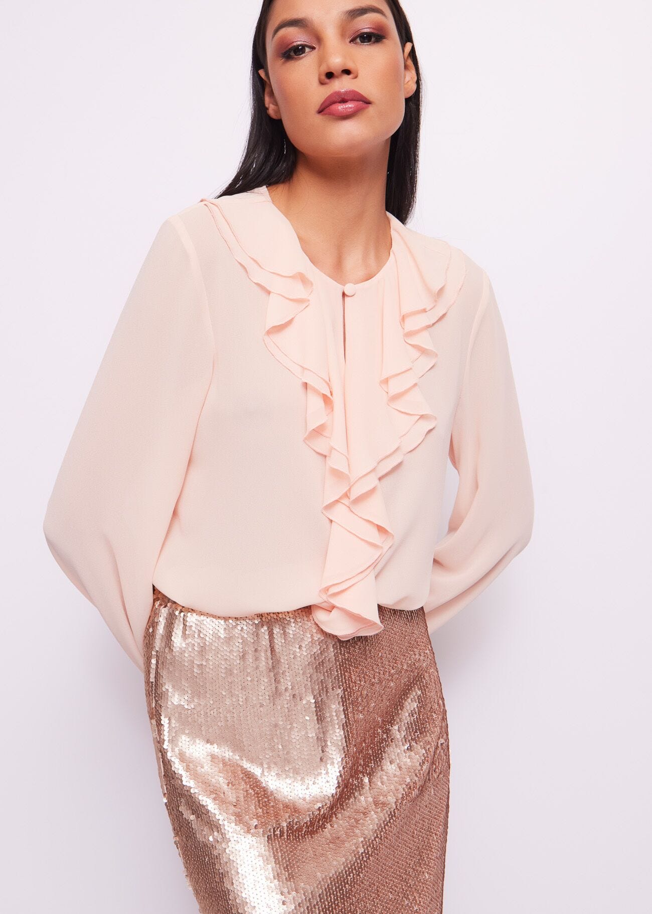 Pink blouse with ruffles