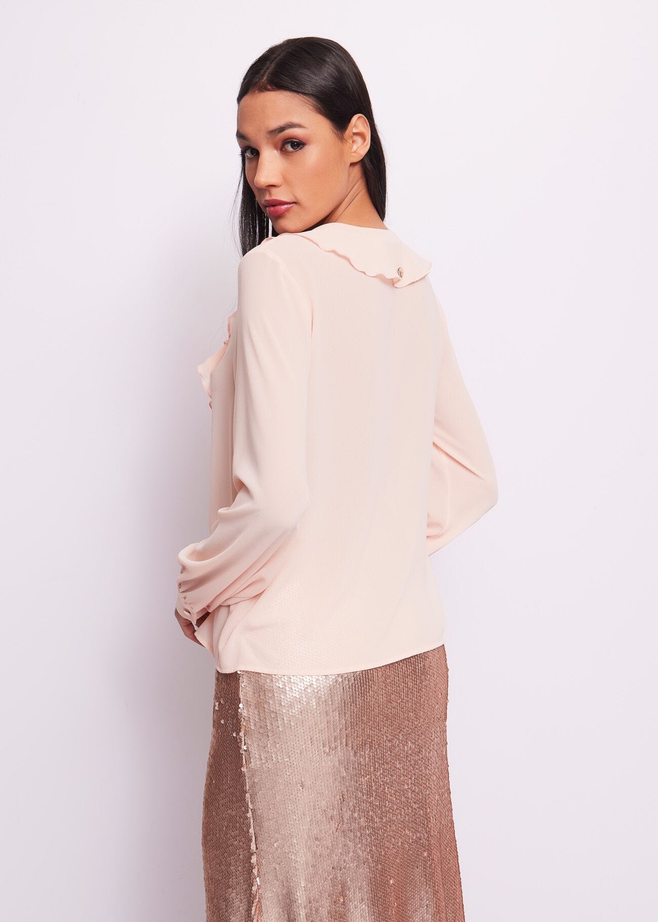 Pink blouse with ruffles