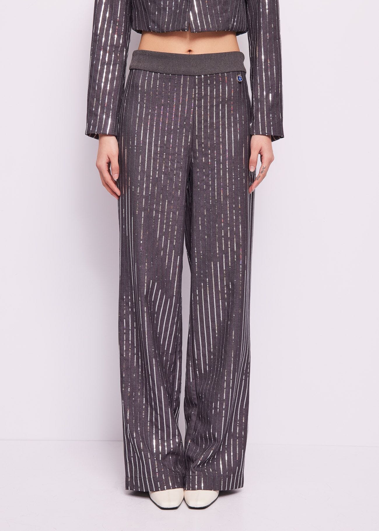 Trousers with sequins