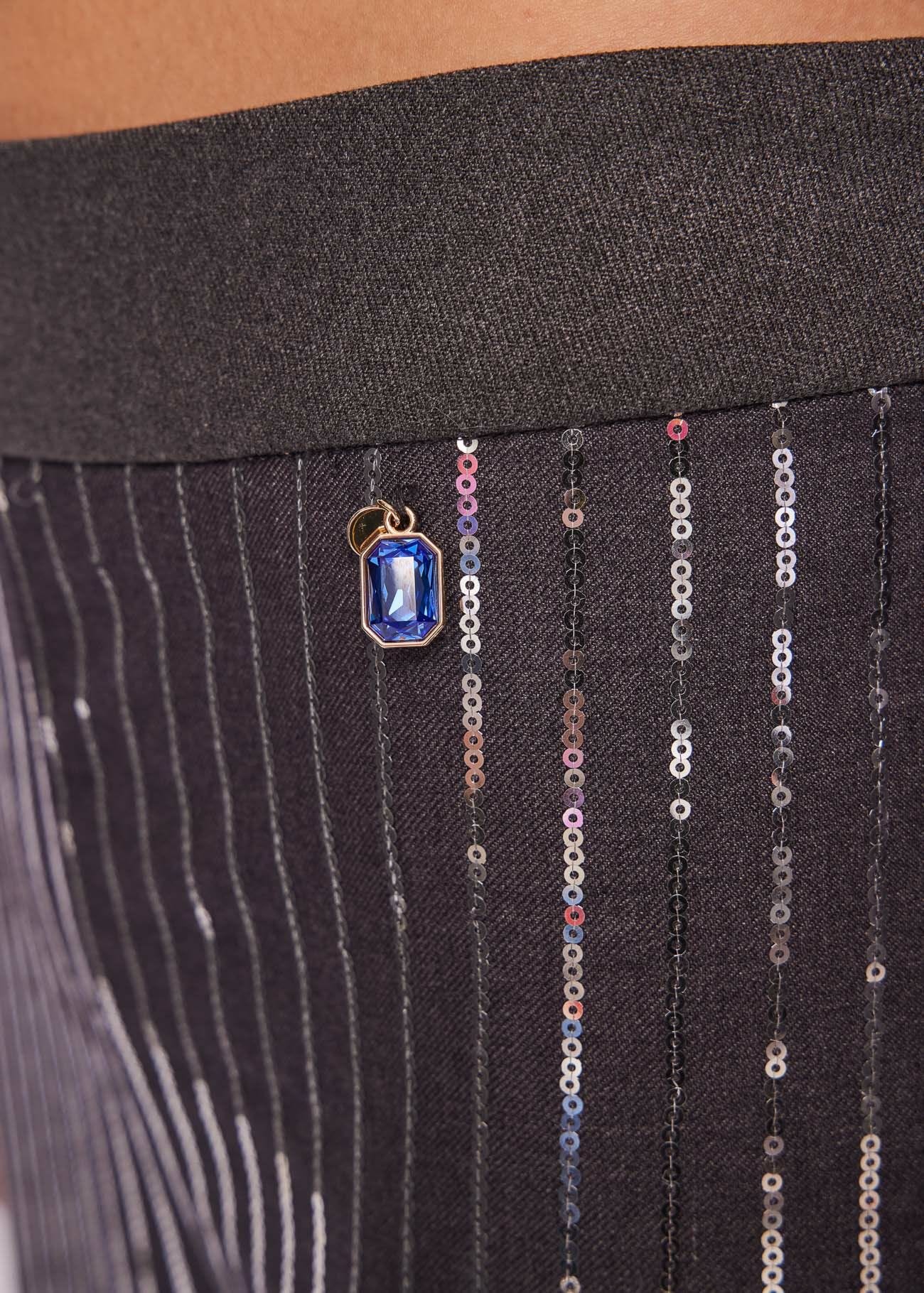 Trousers with sequins