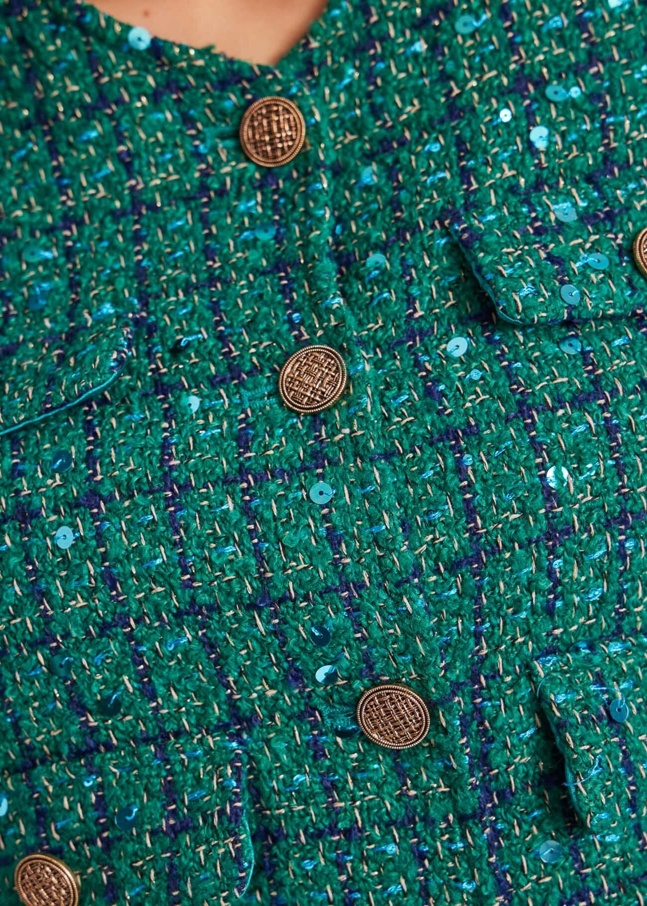 Chaqueta corta en bouclé verde