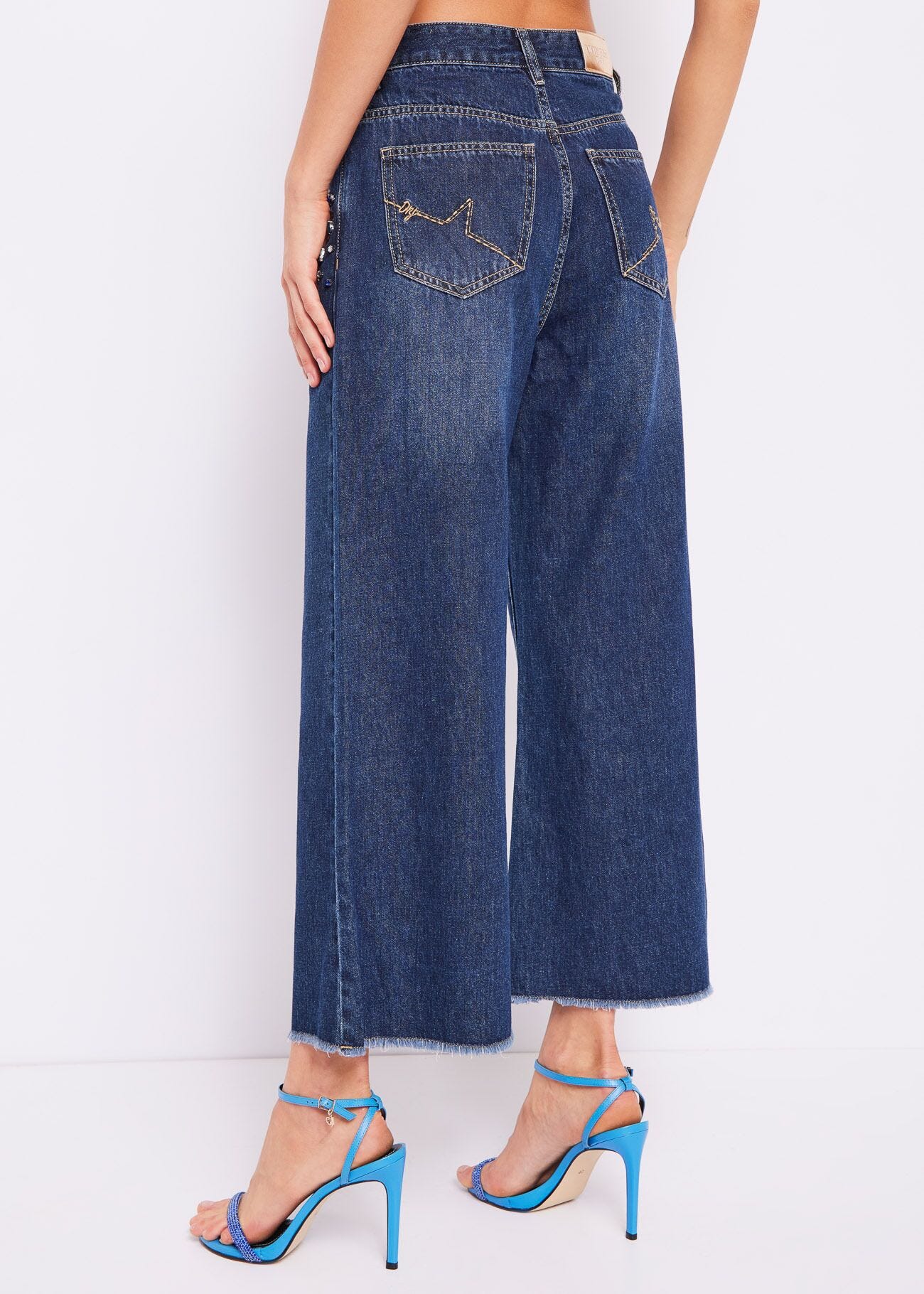 Jeans wide cropped con strass