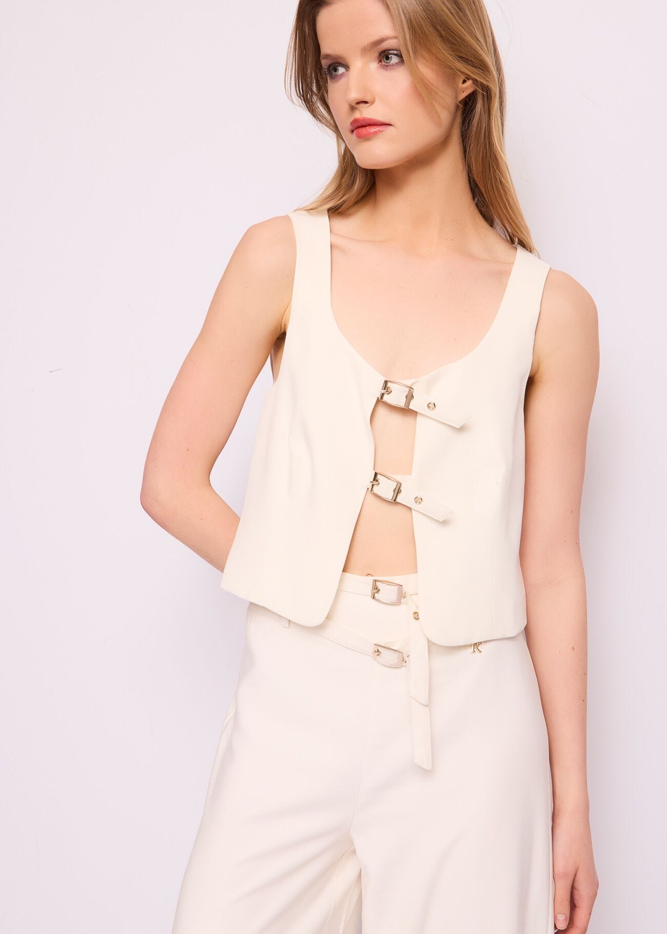 White vest with buckles