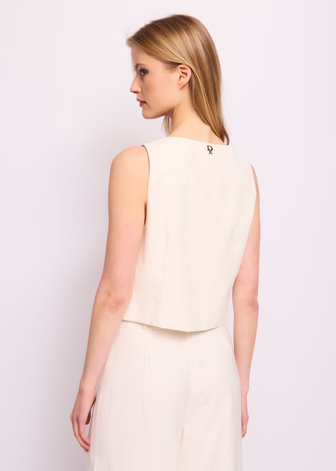 White vest with buckles