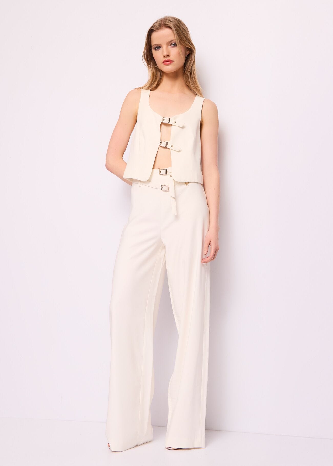 White vest with buckles