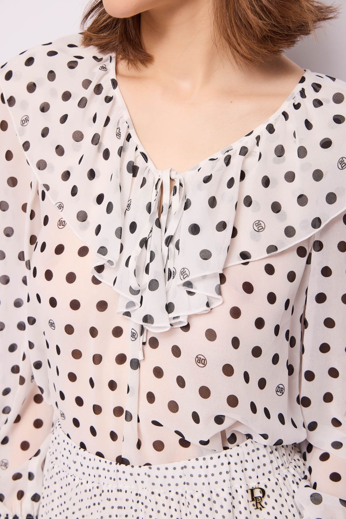 Blusa bianca in georgette a pois
