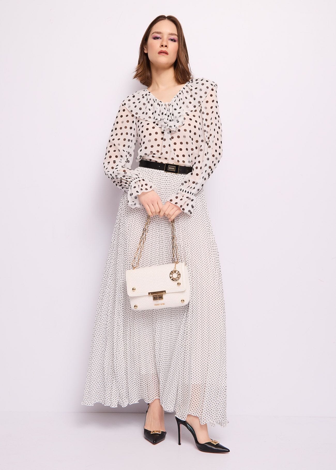 Blusa bianca in georgette a pois