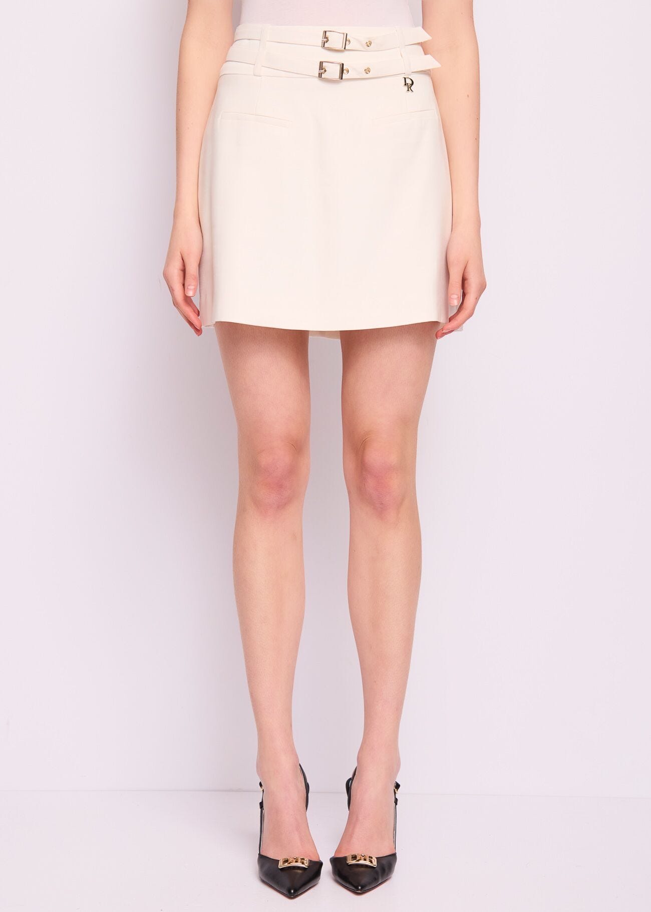 White mini skirt with buckles