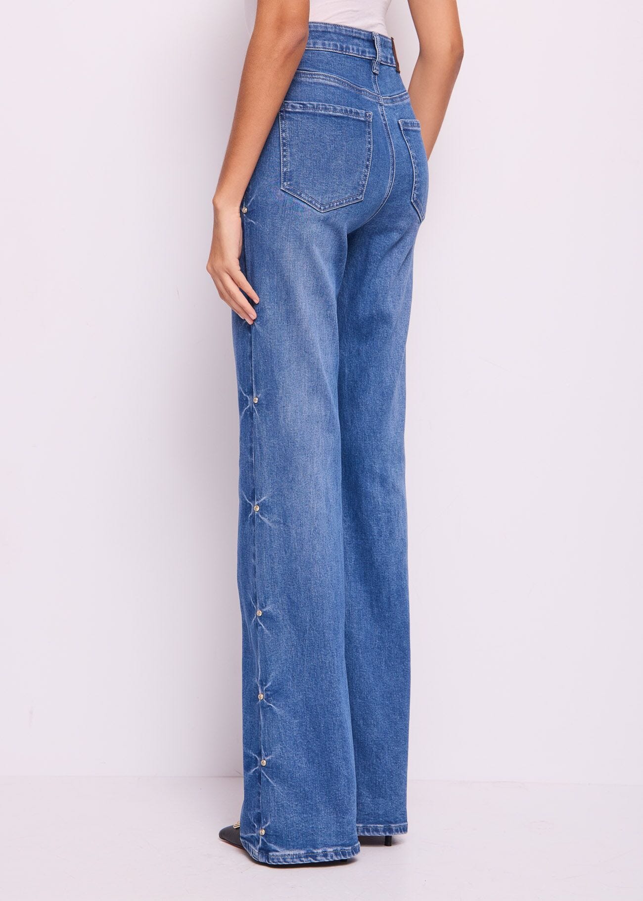 Jeans flare in cotone con strass