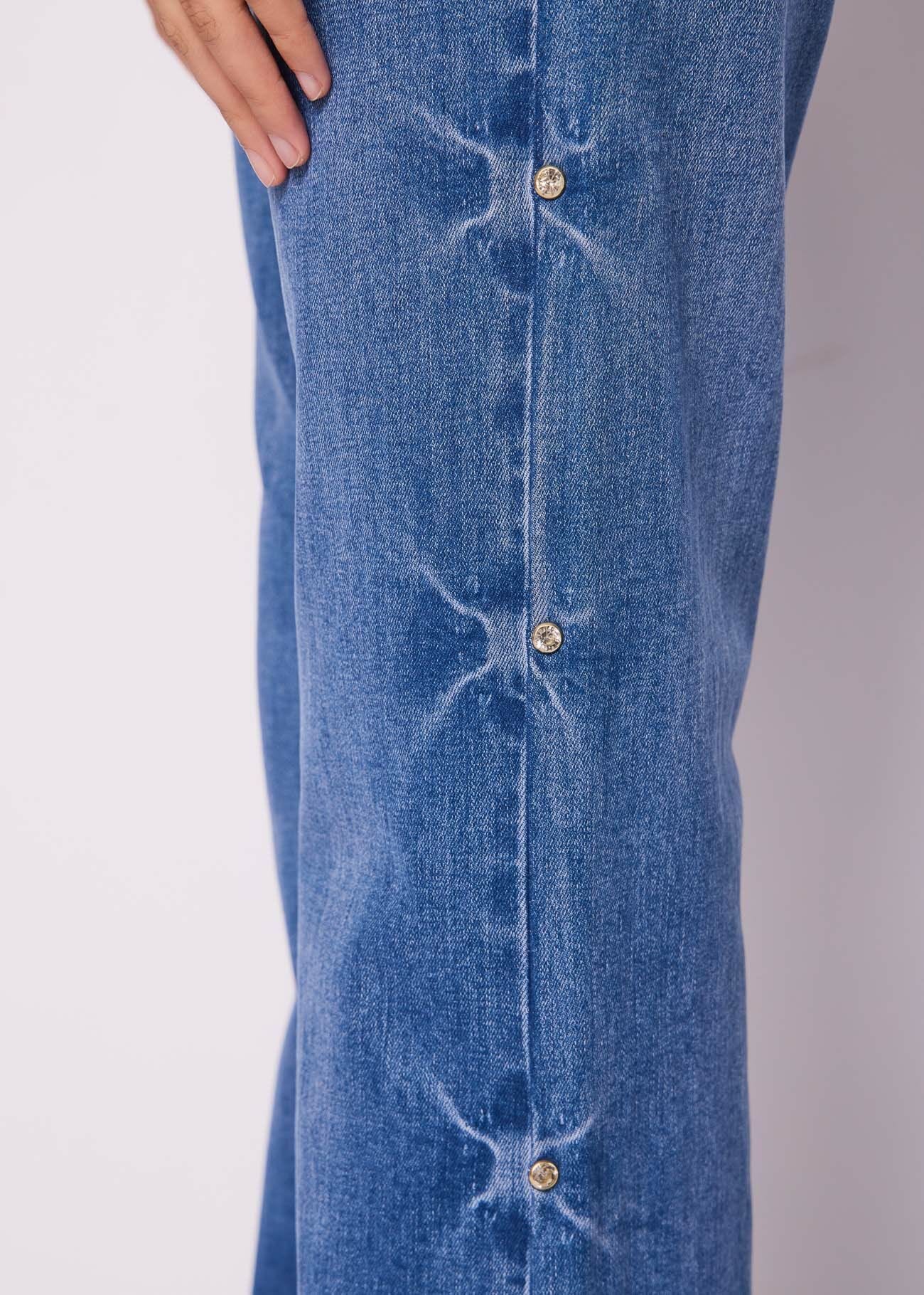 Jeans flare in cotone con strass