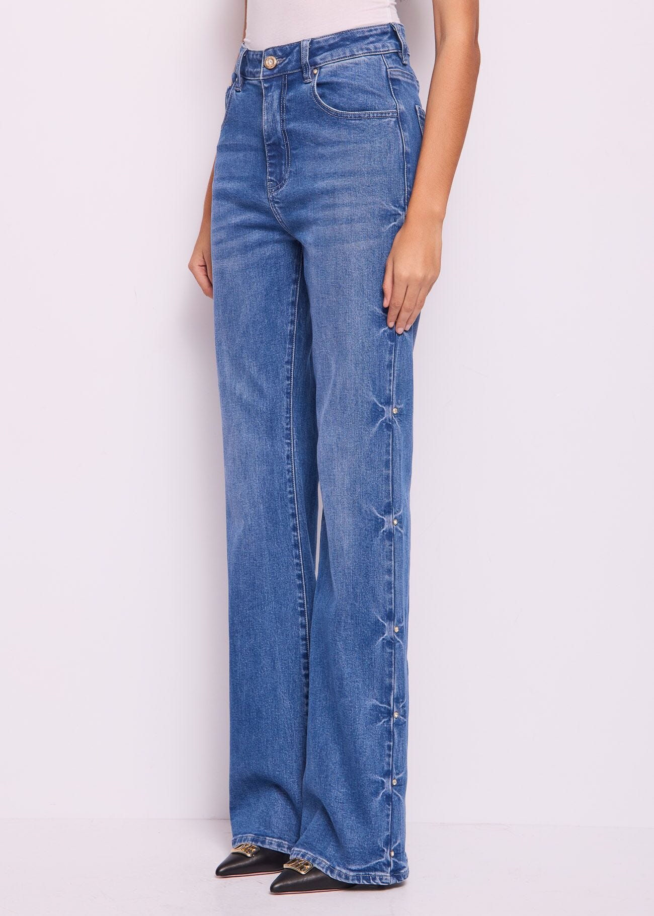 Jeans flare in cotone con strass